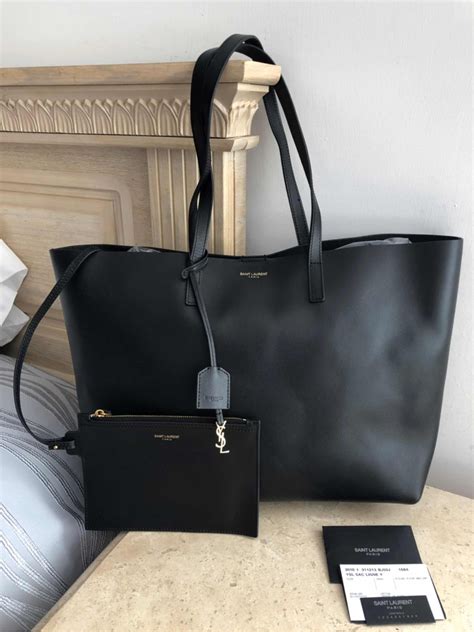 ysl bolsa negra|bolso de piel y lona.